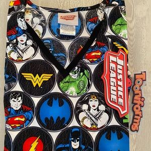 Justice League Scrub Top. NWT. Size Medium.